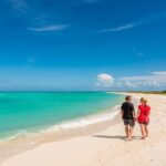 21 Ways to Get Paid to Travel The World get-paid-to-travel-the-world-Key-West-vacation-Dave-Deb-beach.jpg