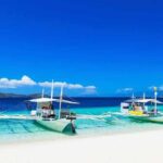 All You Need to Know to Visit Boracay Philippines visit-boracay-boats-beach.jpg
